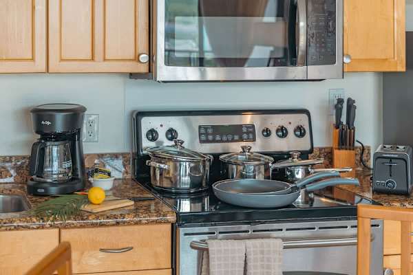 Kitchen equipped with full-size appliances for your culinary needs.