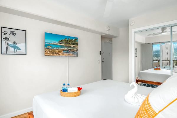 Master bedroom with 43'' Hisense Smart TV.