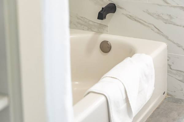Bathtub in the master bedroom bathroom.