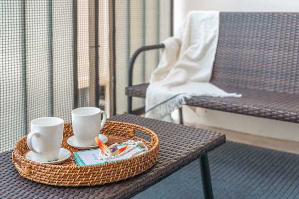 Enjoy morning coffee or evening cocktails on your balcony.