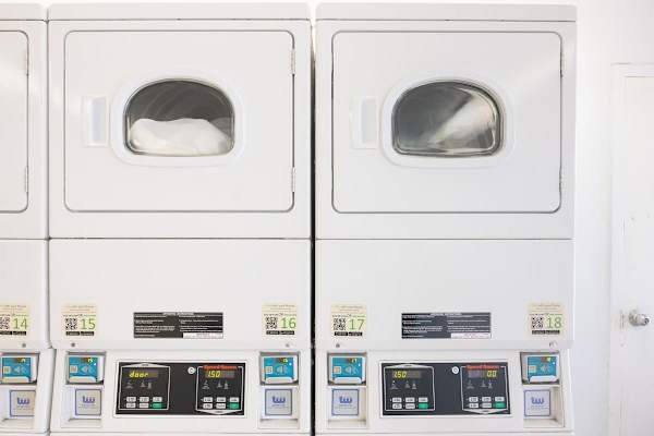 Credit card and coin-operated laundry area.