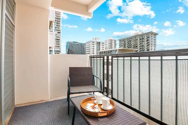 Enjoy morning coffee or evening cocktails on your balcony.