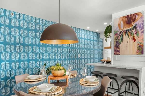 Dining area with table and 4 chairs, and retro pendant lampshade