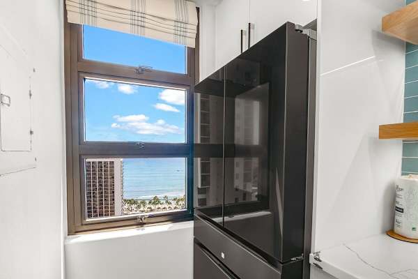 A Samsung Bespoke Smart Refrigerato with a beverage center and 2 types of ice maker.