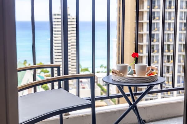 Table and 2 chairs on your balcony.