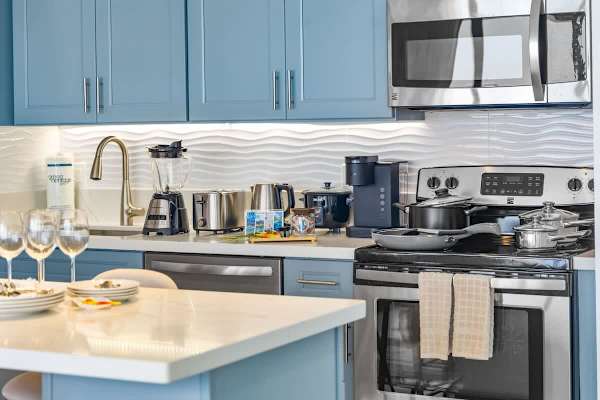 Full-size appliances and utensils are available in the kitchen.