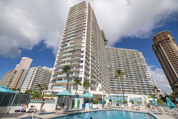 Dive into luxury at the Ilikai Hotel’s sun-soaked pool deck, rising high above the heart of Waikiki for the ultimate island lifestyle.