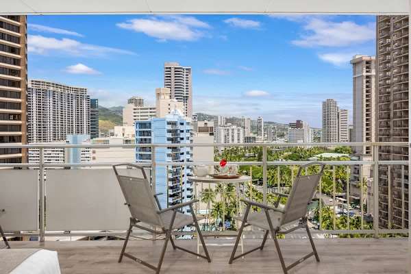 Enjoy shared meals, coffee, or cocktails on your balcony with a table and 4 chairs plus a city view!
