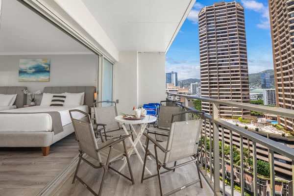 Enjoy shared meals, coffee, or cocktails on your balcony with a table and 4 chairs plus a city view!