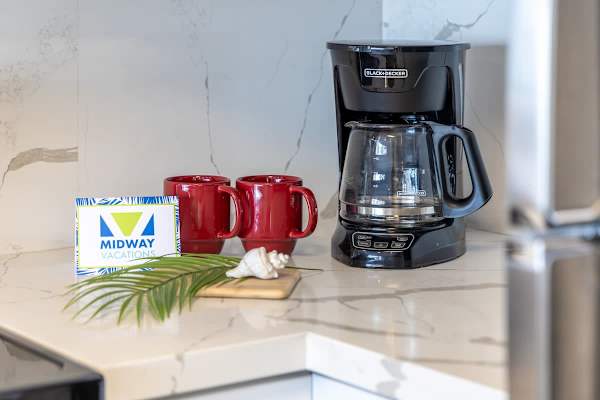 You also have a coffee maker in the kitchen.