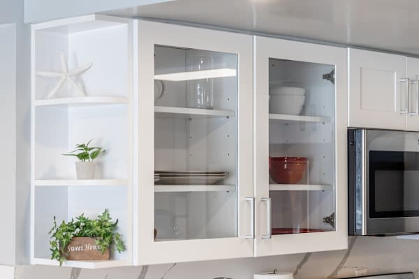 Cabinet in the kitchen for dishes and utensils.
