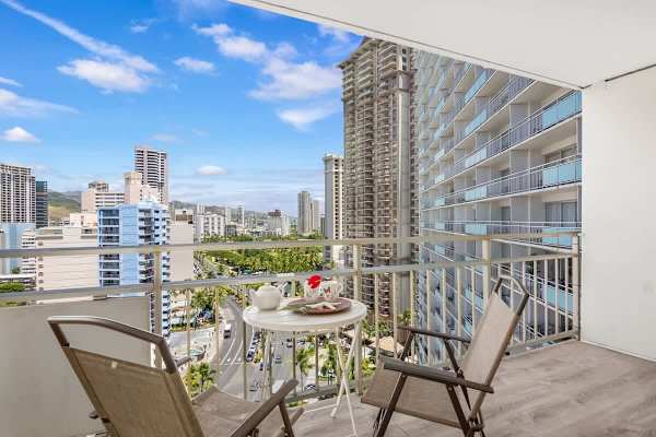Enjoy coffee while having a city view from your balcony.