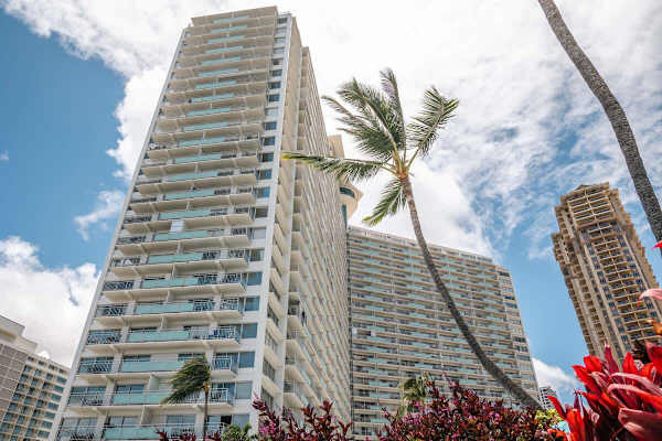 Exterior view of the iconic Ilikai Hotel in Oahu, Hawaii, your gateway to oceanfront living and Waikiki convenience.