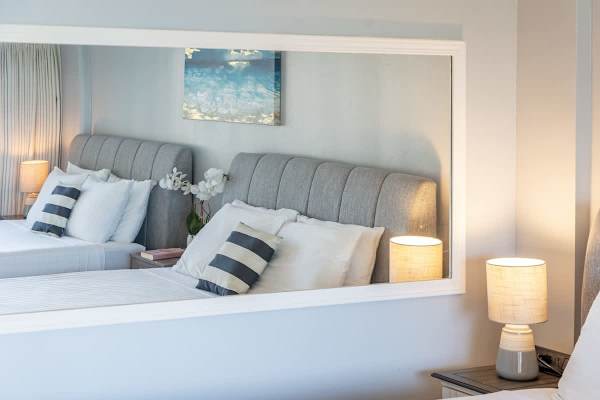 A wall-mounted mirror.