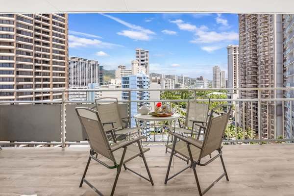 Enjoy shared meals, coffee, or cocktails on your balcony with a table and 4 chairs plus a city view!