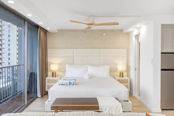 A beautifully renovated studio condo with a king-size bed and new mattress for a comfortable and relaxing sleep.