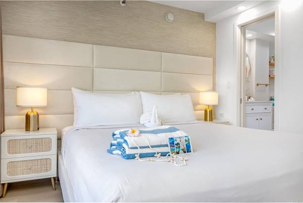 A beautifully renovated studio condo with a king-size bed and new mattress for a comfortable and relaxing sleep.