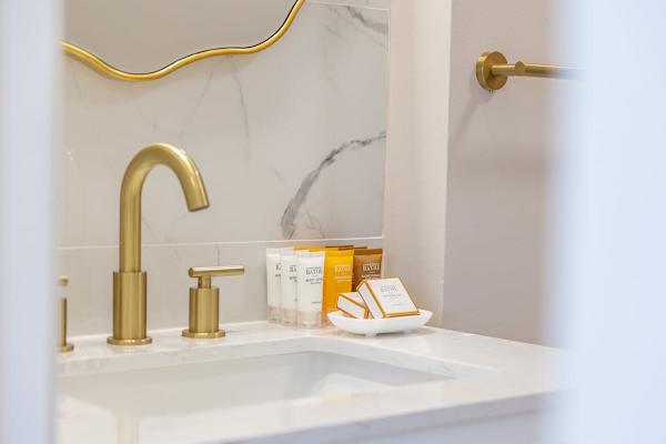Bathroom with startup kit supplies not replenished.