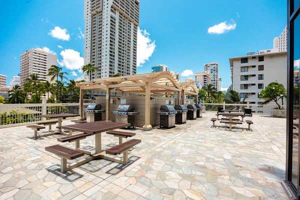 Enjoy outdoor dining and grilling on our shared BBQ area on the 6th floor, complete with multiple grills and picnic tables for your convenience.