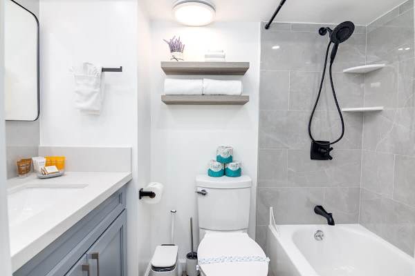 Refresh in your full bathroom with tub and shower combo after a day of exploring the island.