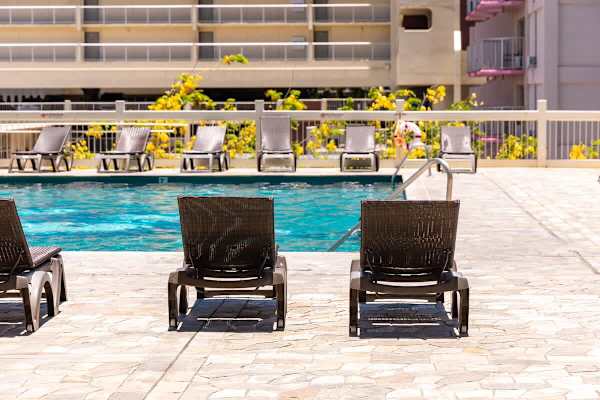 Relax poolside on comfortable lounge chairs, enjoying a refreshing dip or simply basking in the sun by the inviting waters.
