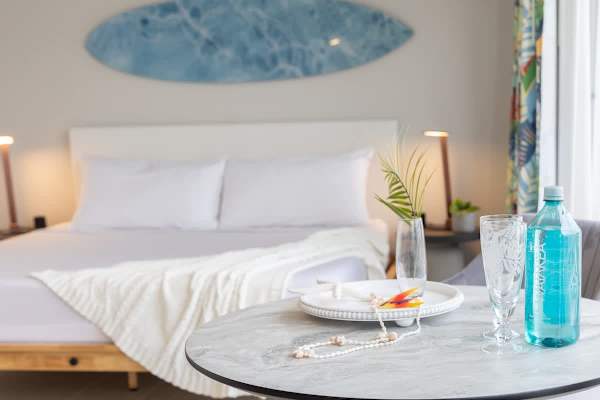 Enjoy your stylish studio featuring a comfortable king bed, split AC, and ocean and city views from your window.