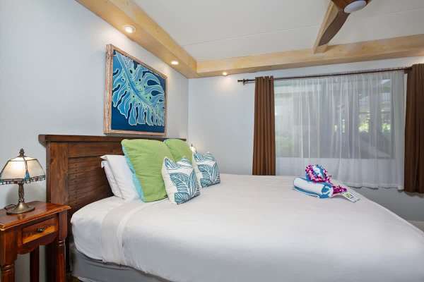 Have a restful night's sleep in your bedroom with a king-size bed, and a ceiling fan.