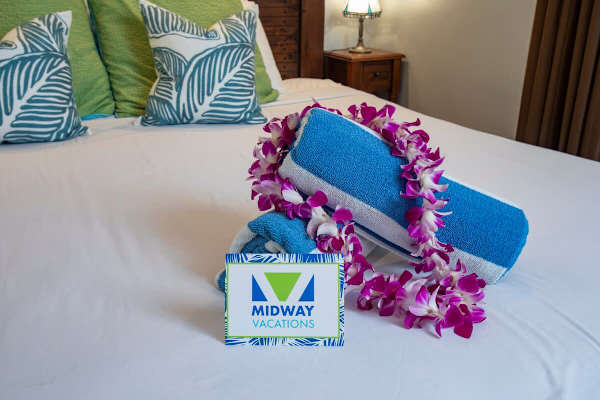 Have a restful night's sleep in your bedroom with a king-size bed, and a ceiling fan.