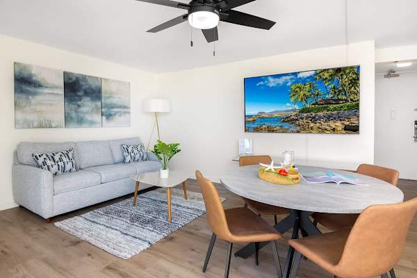 Step into your newly renovated cozy studio featuring a massive 75" Smart TV for cinematic viewing and a pull-out sleeper sofa for relaxing.