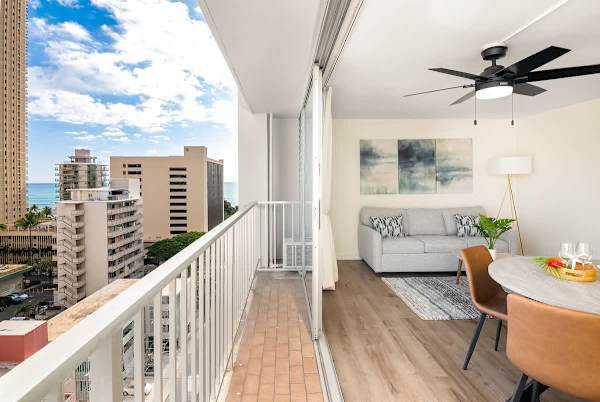 Sip your coffee on the step-out balcony while soaking in stunning high-rise and ocean views before stepping back into your stylish, modern retreat.
