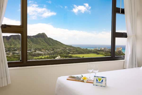 Enjoy the ocean and Diamond Head mountain views from your bedroom