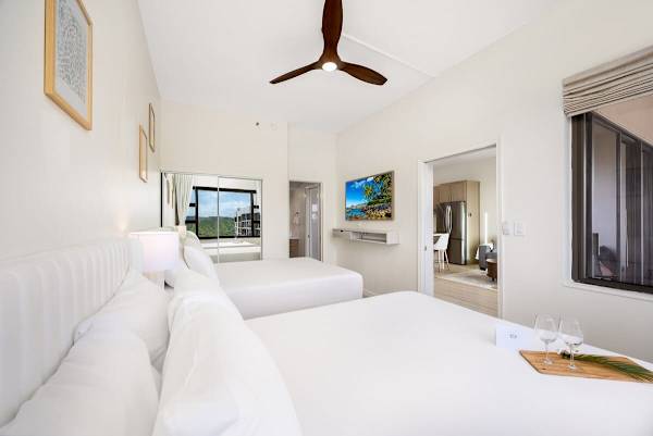 Bedroom with 2 queen-sized beds, 55" smart TV, and beautiful views