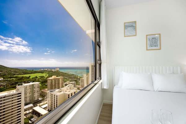 Enjoy the ocean and Diamond Head mountain views from your bedroom