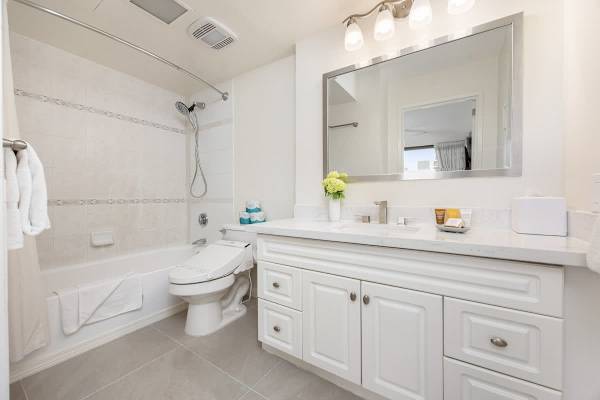 Full bathroom with tub and shower combination