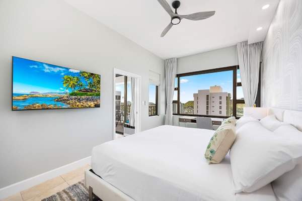 Enjoy watching TV while relaxing in the bedroom