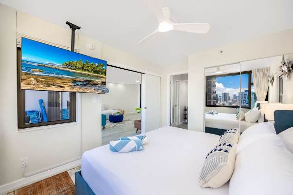 Enjoy watching TV while relaxing in the bedroom