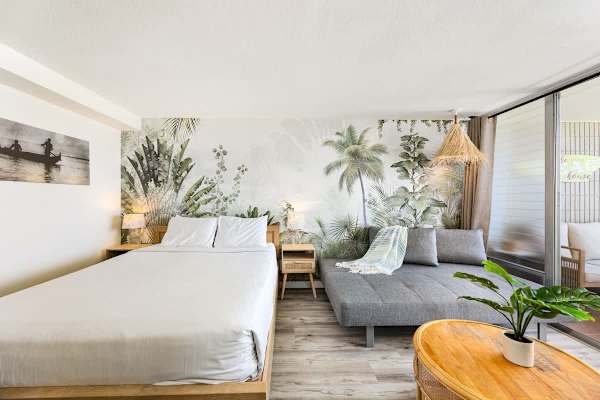 A queen-size bed and a futon sofa that can be convertible as a bed, perfect for relaxing after a long fun day!