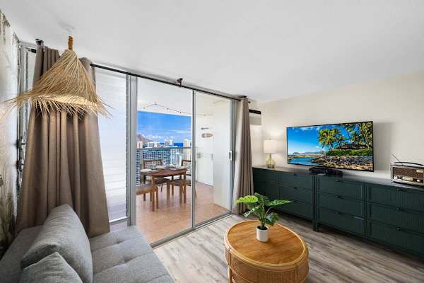 You don't need to miss out on your favorite shows because this studio has a 54" Smart TV for you!