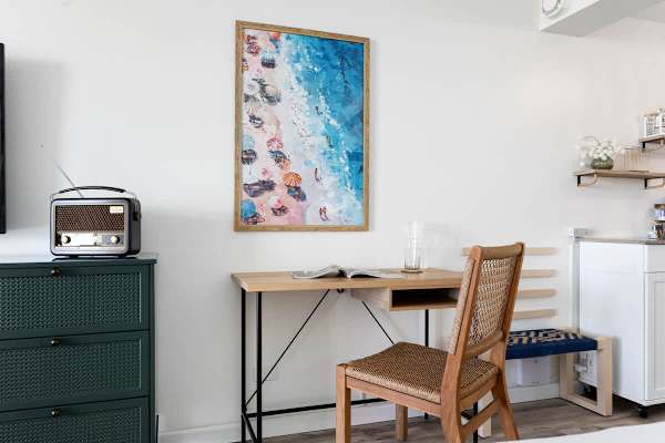 There is a designated working space with a table and a chair for your convenience