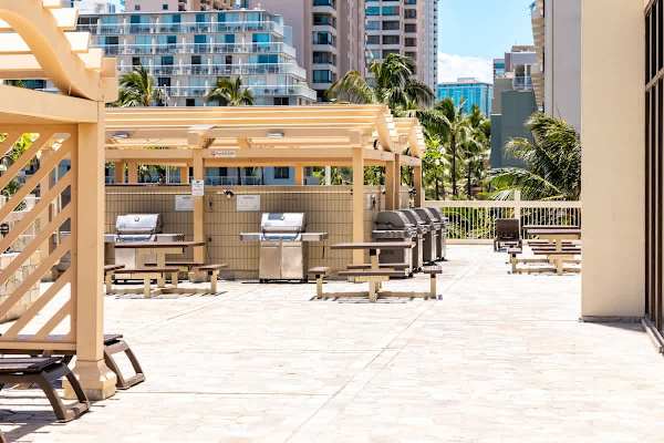 Enjoy outdoor dining and grilling in our shared BBQ area on the 6th floor, complete with multiple grills and picnic tables for your convenience.