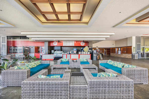 Relax in the inviting common area, featuring comfortable seating and a convenient snack bar!