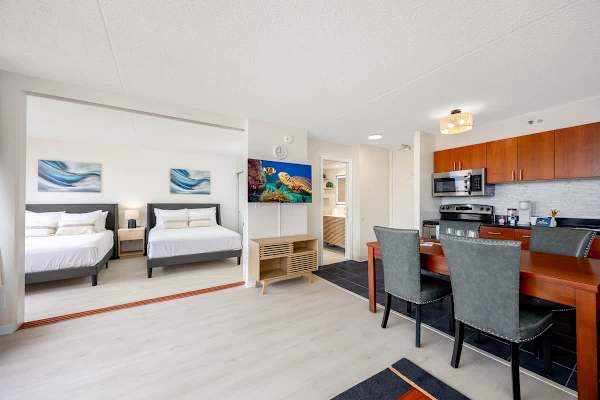 Enjoy the convenience of a fully equipped kitchen, plus seamless access to the modern bathroom