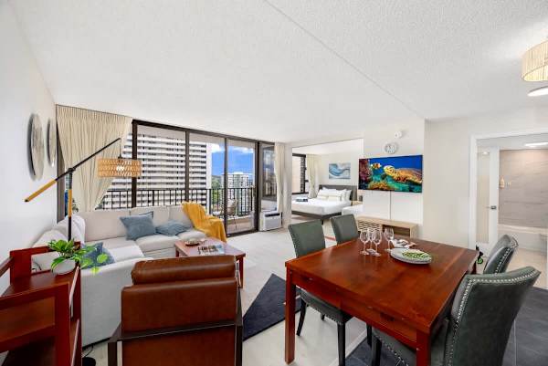 Entertain in style with a dedicated dining area for four and enjoy your favorite shows on the 48-inch smart TV, all within this bright and inviting open-concept living space