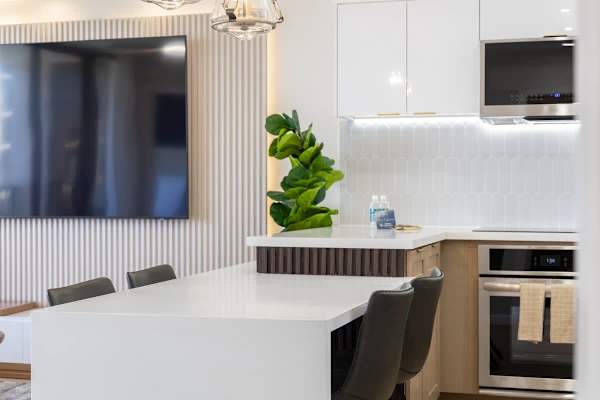 Gather and share memorable meals at your sleek island dining area.