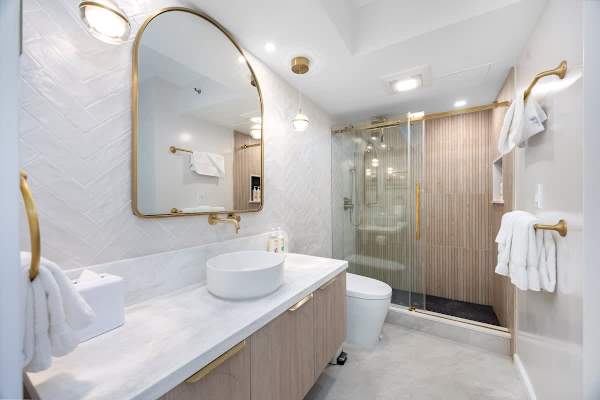 Refresh and rejuvenate in your spa-inspired bathroom, featuring modern finishes and a spacious walk-in shower for ultimate comfort.