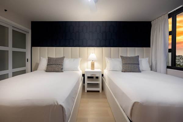 Have a relaxing sleep in your bedroom with 2 queen beds while enjoying the night views from your window.