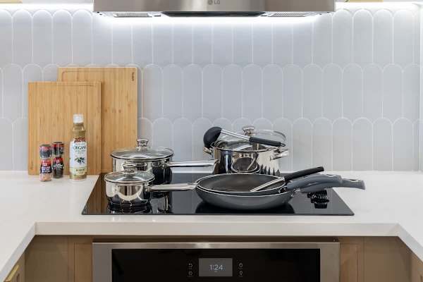 Unleash your inner chef in the fully stocked kitchen, complete with quality pots, pans, and cooking essentials for all your island culinary adventures.