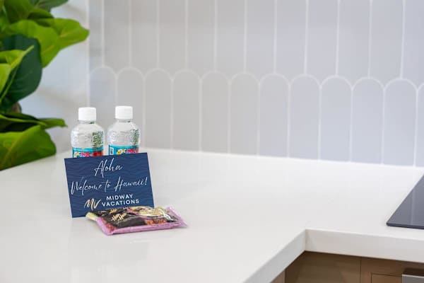 Upon arrival, your Hawaiian retreat greets you with refreshing bottled water and a delightful taste of local hospitality.