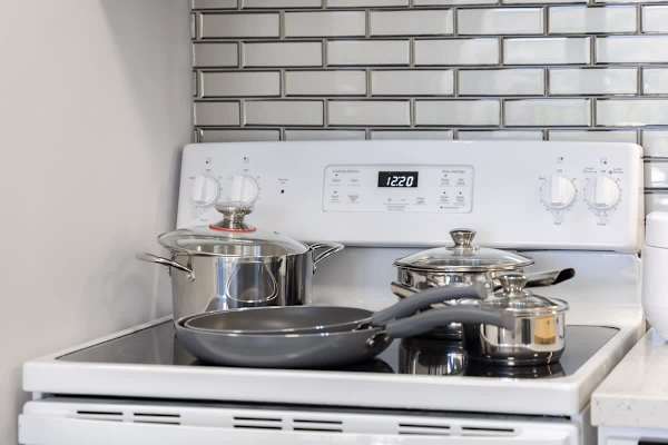Enjoy the convenience of a fully equipped kitchen, featuring all the pots, pans, and cooking essentials you need for a home-cooked experience.