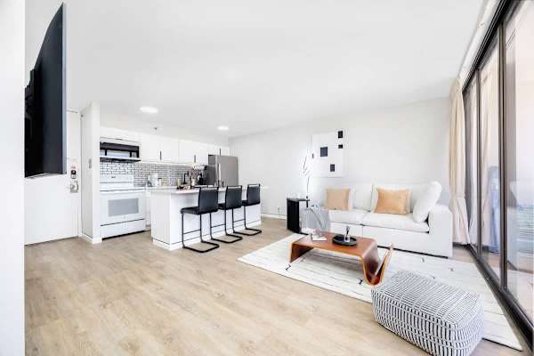 Discover the perfect blend of style and comfort in this spacious open-concept living area, ideal for relaxing and entertaining.